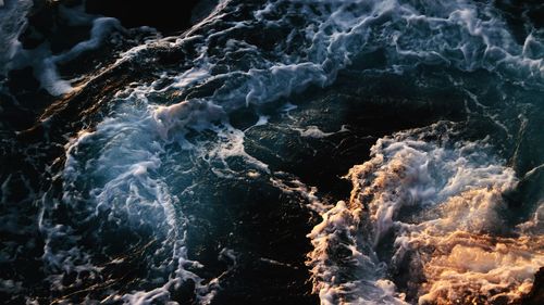 Full frame shot of rocks in sea