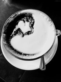 High angle view of coffee cup on table