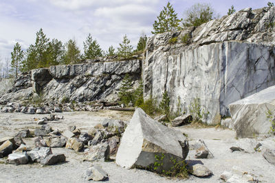 Rocks on mountain against sky