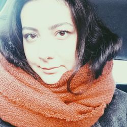 Portrait of young woman at home