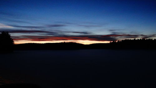 Silhouette of trees at sunset