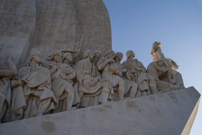 Low angle view of statue against sky