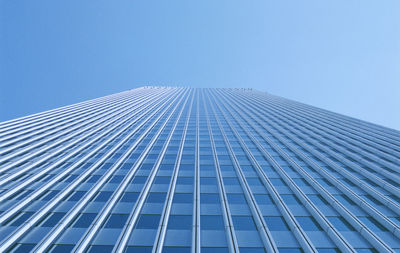 Low angle view of skyscraper against clear sky