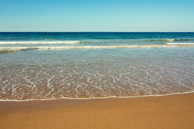 Wide angle shoot summer morning sand beach in the north coastline of northern ireland