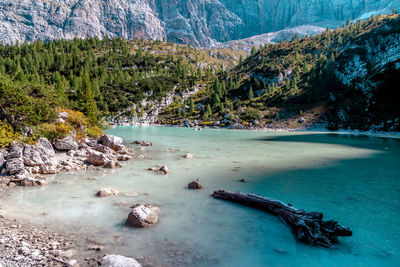 Scenic view of rocks by lake