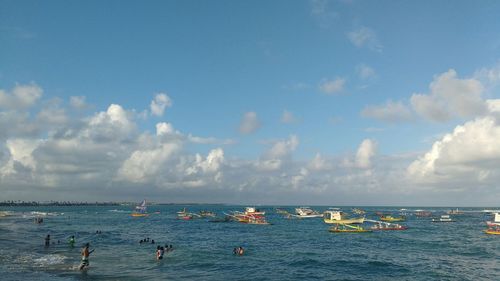 Scenic view of sea against cloudy sky