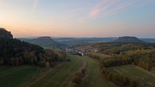 Scenic view of landscape against sky during sunset