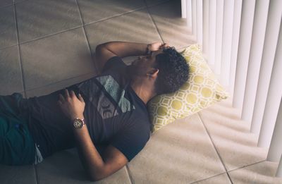 Man lying down on the floor