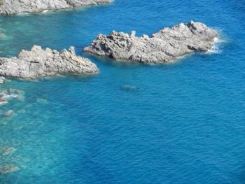 Scenic shot of rock formations in sea