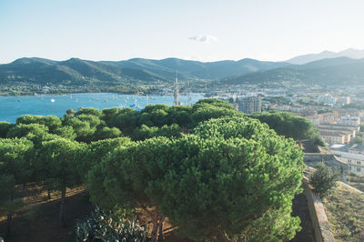 Scenic view of river with mountains in background