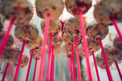Close-up of multi colored lollipops