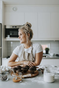 Woman baking in kitchen