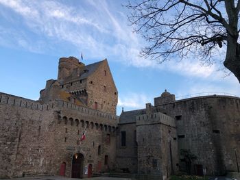 Low angle view of historic building against sky