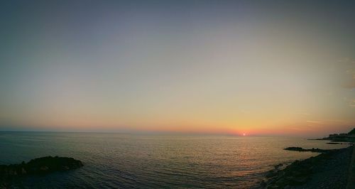 Scenic view of sea at sunset