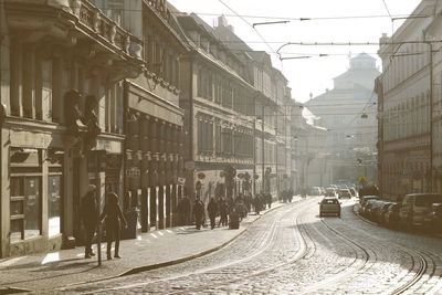 Panoramic view of people on street in city