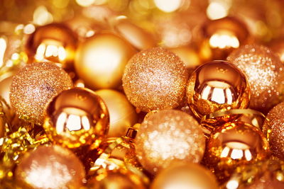 Full frame shot of golden baubles