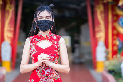 Portrait of woman wearing mask