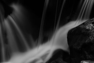 Close-up of waterfall against trees