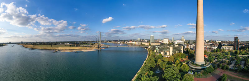 Panoramic view of bridge over river against sky