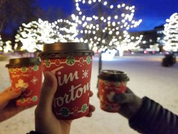 Close-up of hand holding ice cream cone