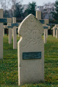 Stone cross in cemetery