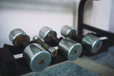 Close-up of old objects on table