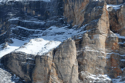 Icicles on rock formation during winter