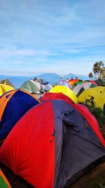 Multi colored tent against sky