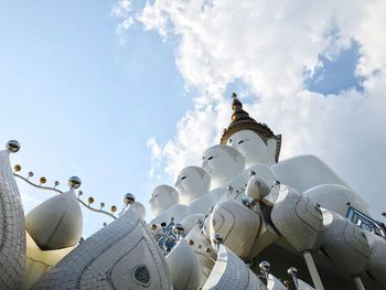 Low angle view of sculpture against sky