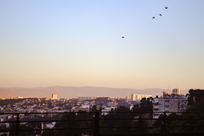 High angle view of townscape against sky during sunset