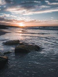 Scenic view of sea against sky during sunset