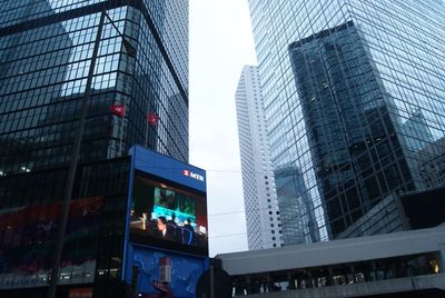 Low angle view of modern buildings in city