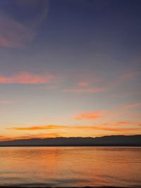 Scenic view of landscape against sky during sunset