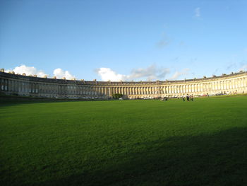 View of palace on field against sky