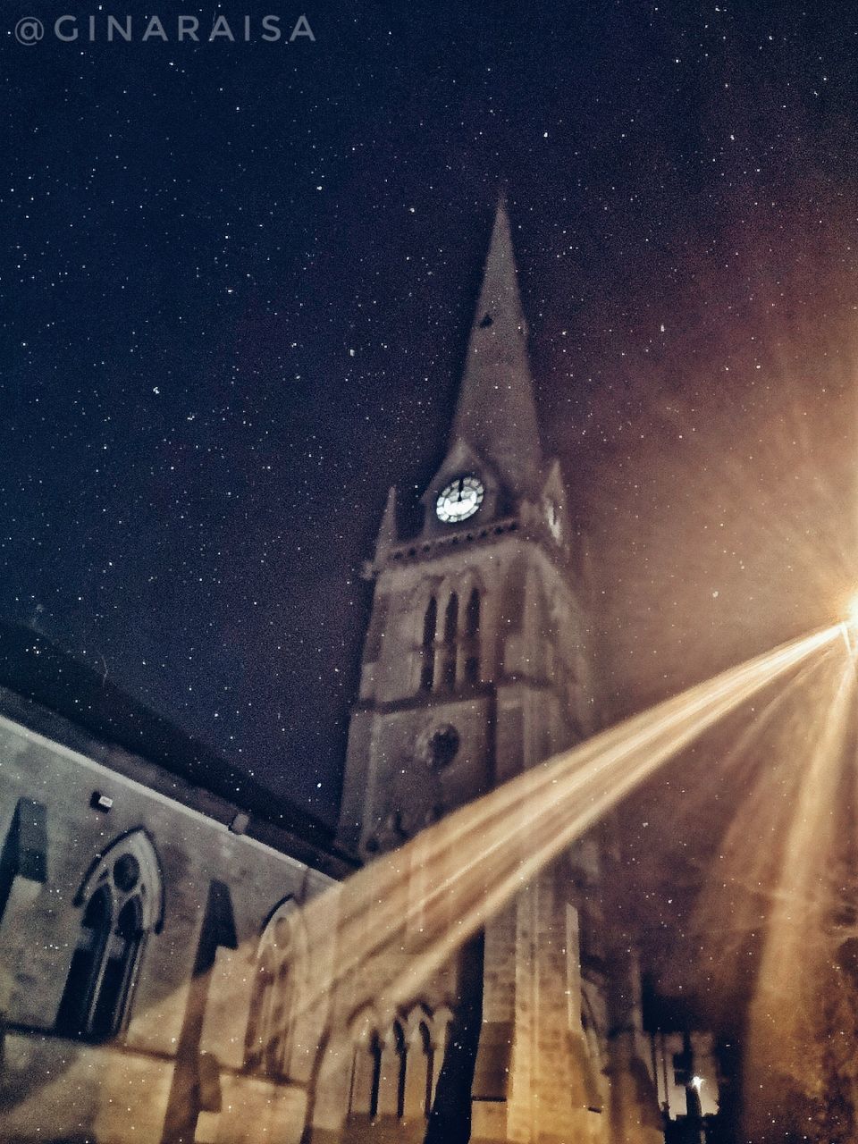 night, architecture, building exterior, built structure, building, tower, sky, space, place of worship, city, star - space, low angle view, astronomy, religion, nature, no people, tall - high, star, snowing, spire