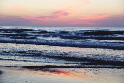 Scenic view of sea at sunset