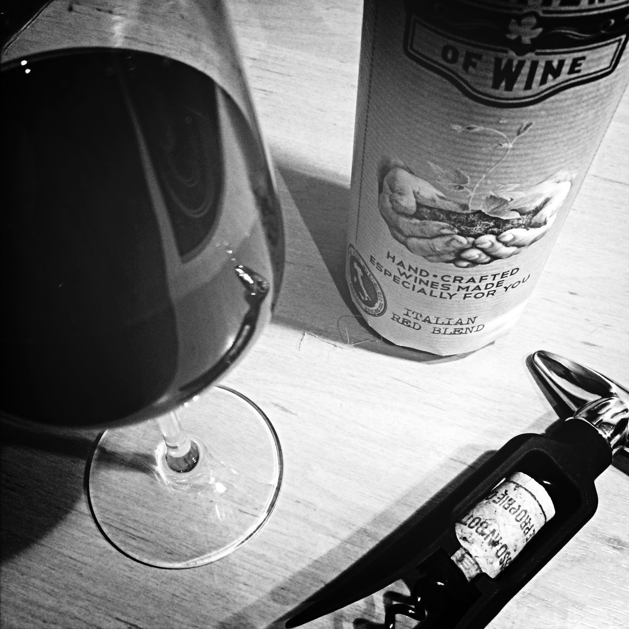 table, indoors, high angle view, still life, close-up, communication, technology, no people, text, absence, day, part of, chair, music, western script, cropped, transportation, sunlight, focus on foreground, food and drink