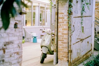 Open door on wall of house