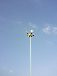 Low angle view of street light against sky