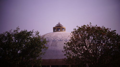 Low angle view of building against blue sky