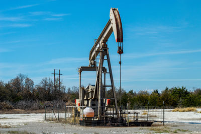 Oil rig  against sky