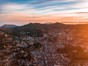 Scenic view of mountains against sky at sunset