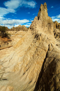 Rock formation against blue sky at tatacoa desert