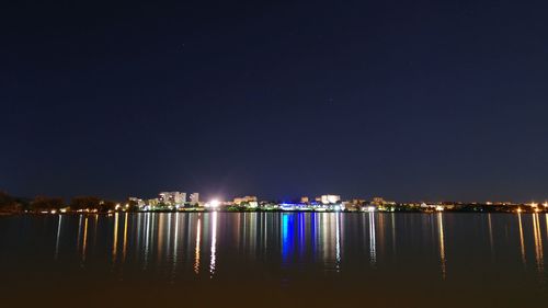 View of illuminated city at night