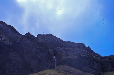 Low angle view of mountains against sky