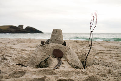 Sandcastle on beach