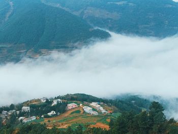 High angle view of townscape against mountains