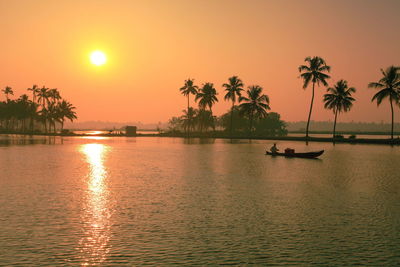 Scenic view of sunset over river