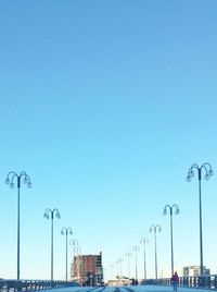 View of street light against blue sky