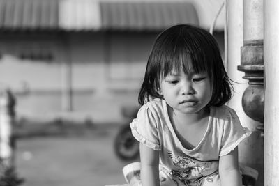 Portrait of cute girl looking at camera